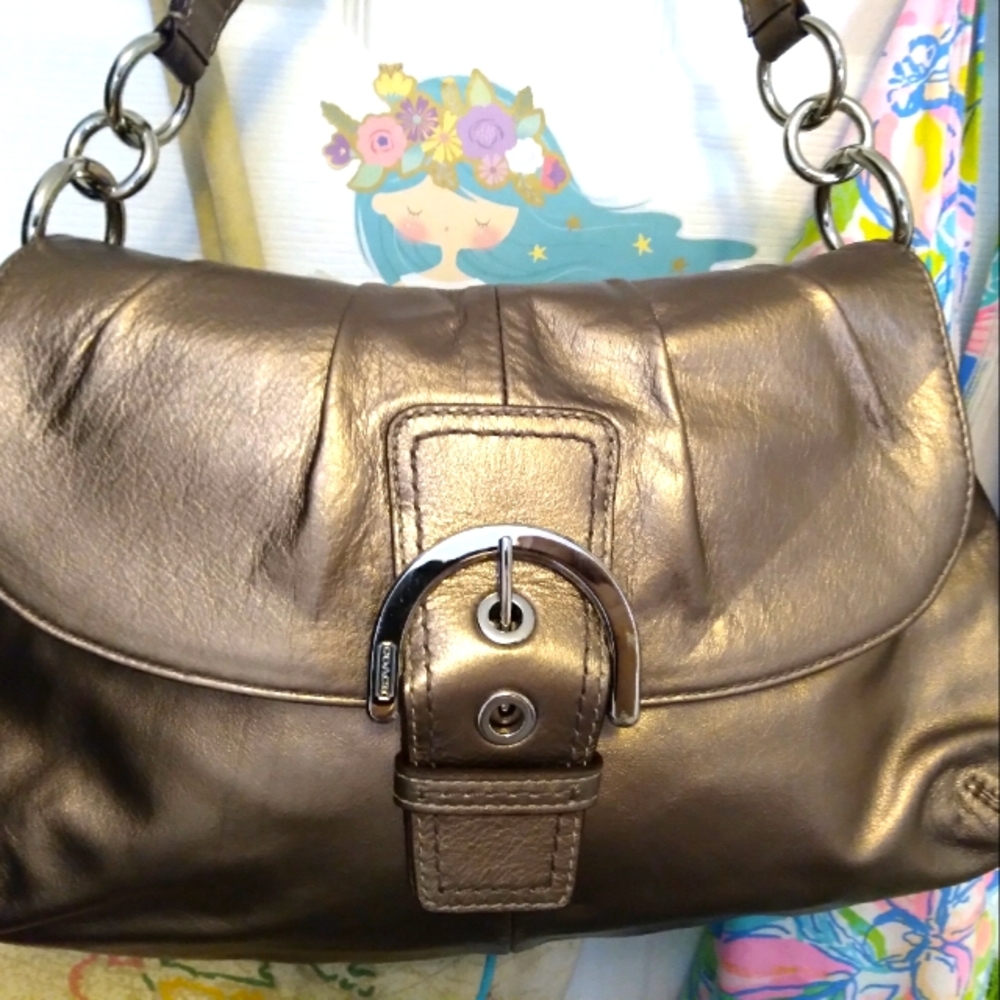 bronzed colored leather coach purse